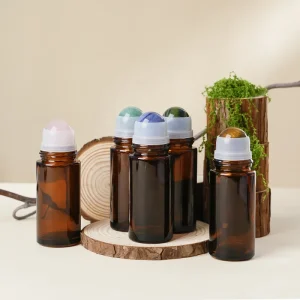 50ml Amber Glass Essential Oil Roll on Bottle with Rose Quartz Gemstone Roller for 100pcs MOQ