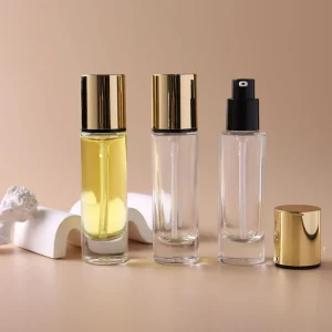 Factory Custom 30ml 1oz Eco Friendly Refillable Cosmetic Glass Lotion Bottle With Foundation Pump Gold Lid
