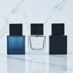 Gradient Acid Etched 50ML Blue Square Glass Perfume Bottle with Black Wooden Lid and Pump Sprayer for Essential Oil