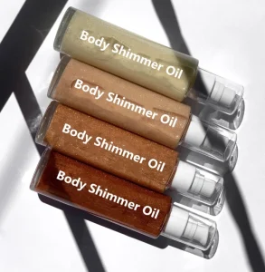 OEM Glowing Body Oil Moisturizing Shimmer Essential Oils With Vitamin C Jojoba Argan Sweet Almond Body Shimmer Oil