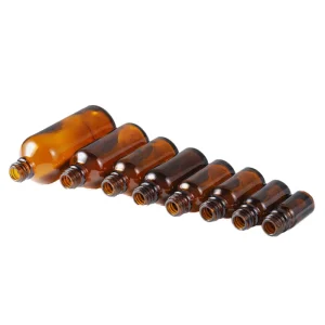 Support Customization 50ml 100ml Amber Glass Bottles Black Pump Head Round Boston Glass Bottle for Essential Oil Lotion